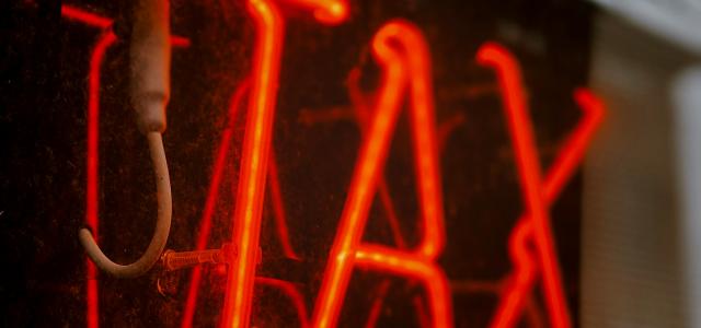 red love neon light signage by Jon Tyson courtesy of Unsplash.